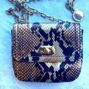 Banana Republic shiny animal print, mini leather crossbody handbag.